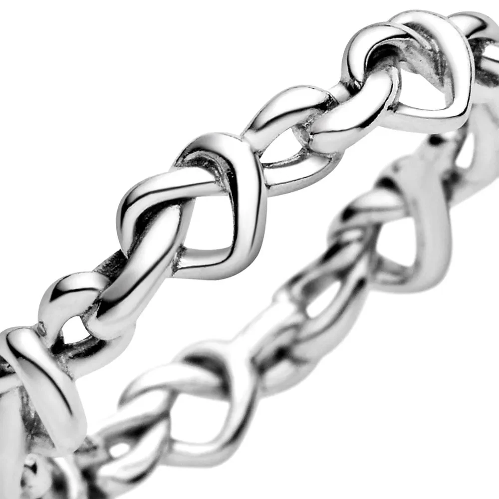 KNOTTED HEARTS SILVER RING