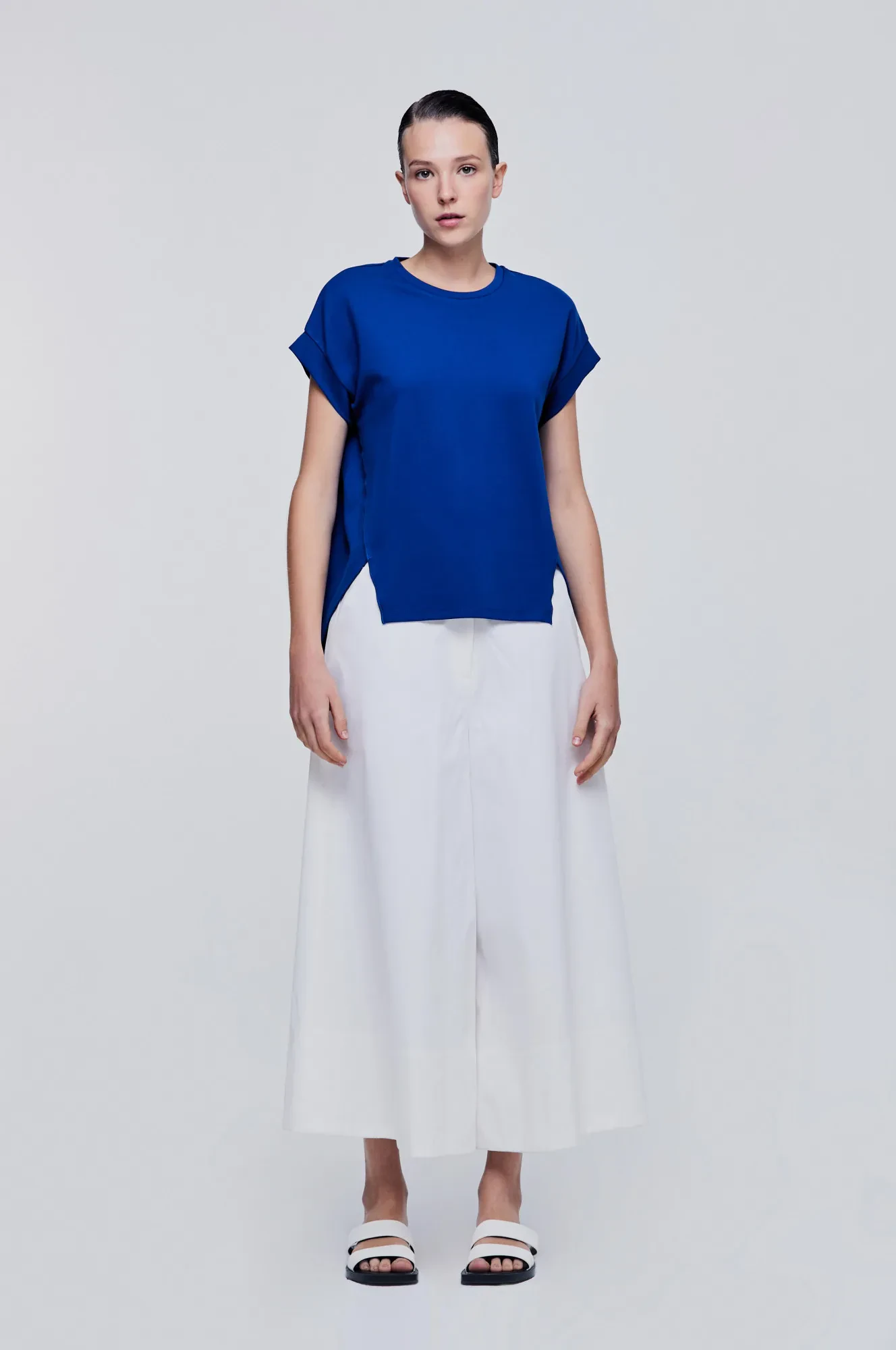 ASYMMETRICAL HEM TOP