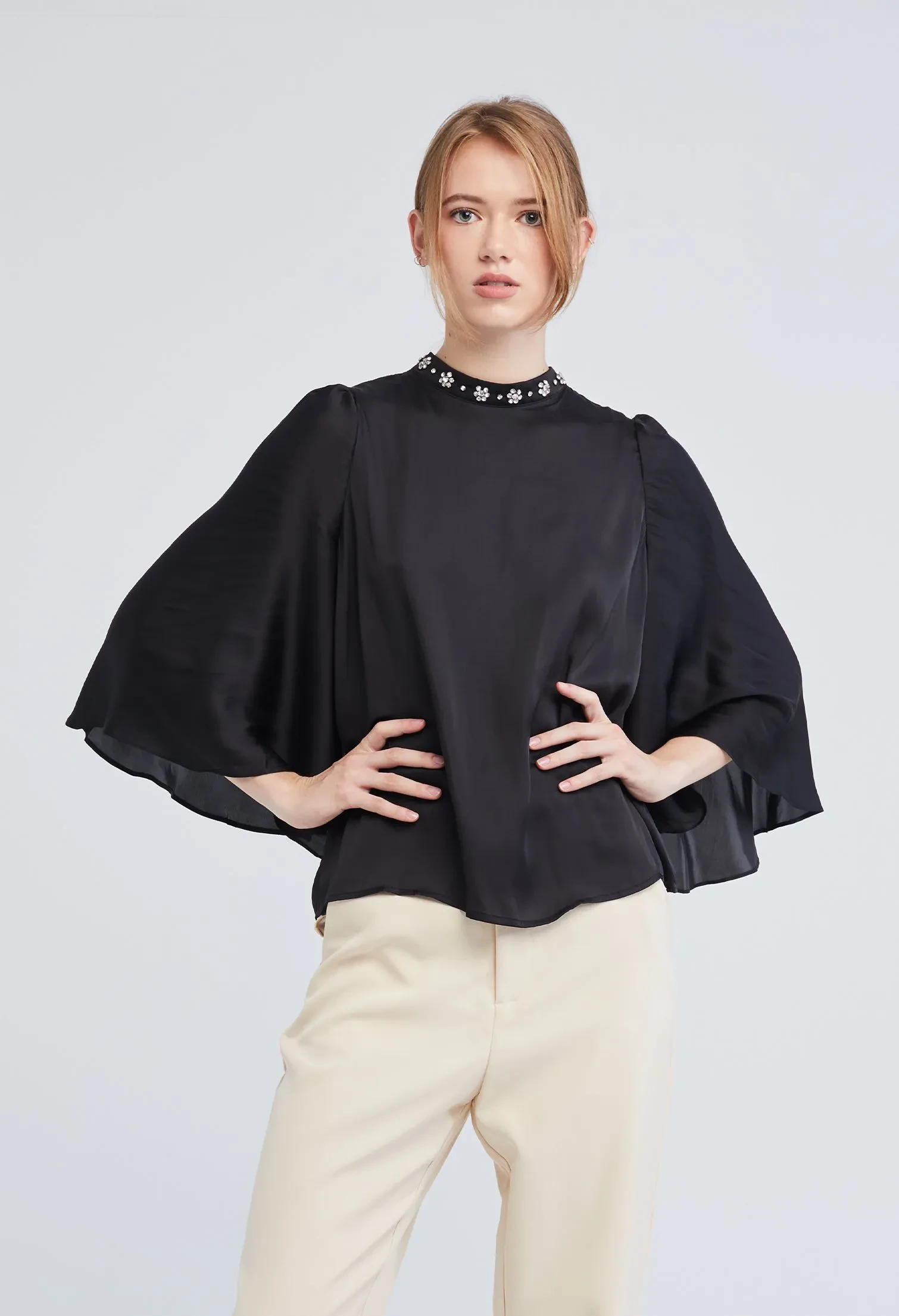 EMBELLISHED CAPE HIGH NECK BLOUSE [BLACK]
