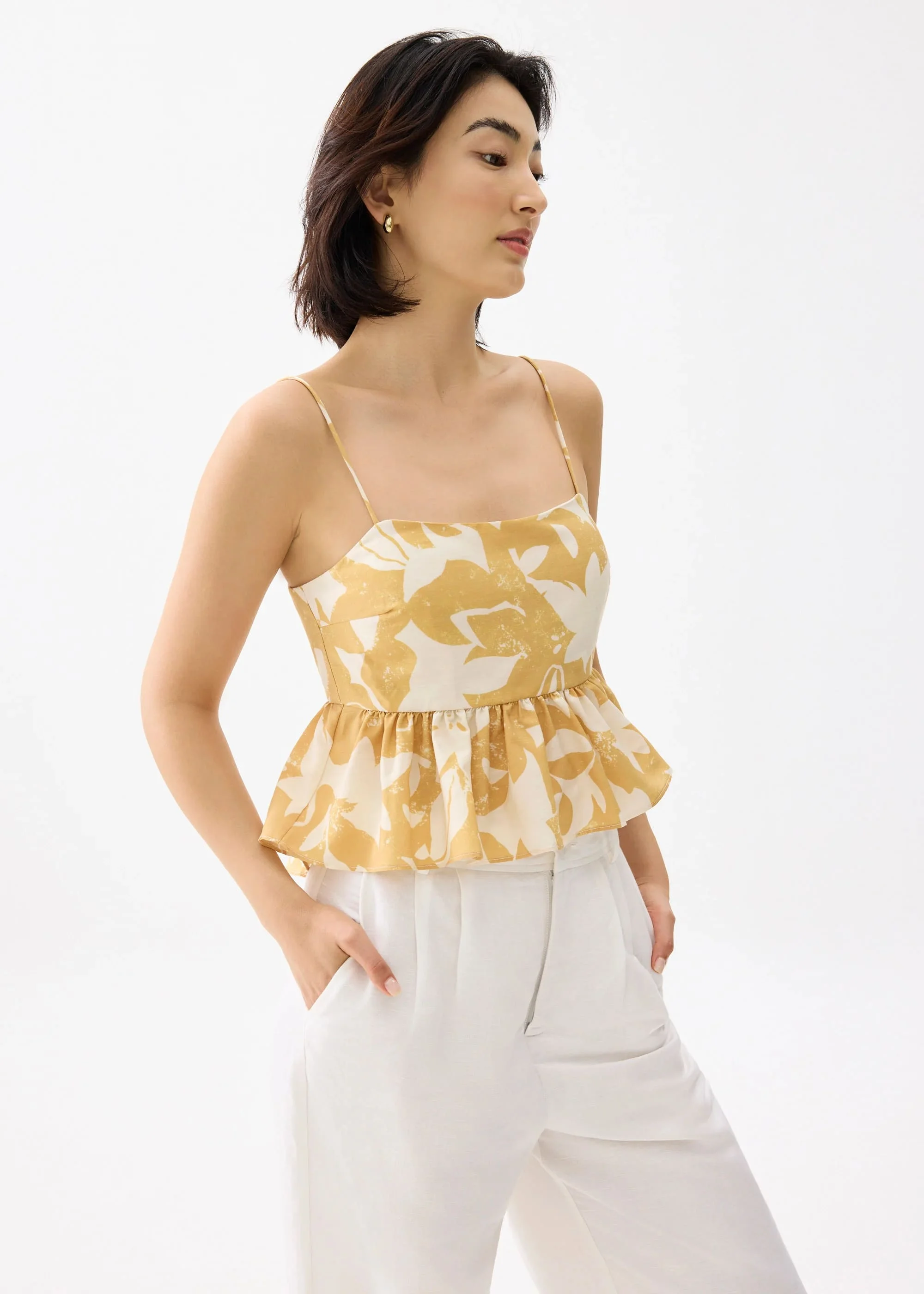 PADDED BABYDOLL PEPLUM TOP IN SUNBURST - GOLD
