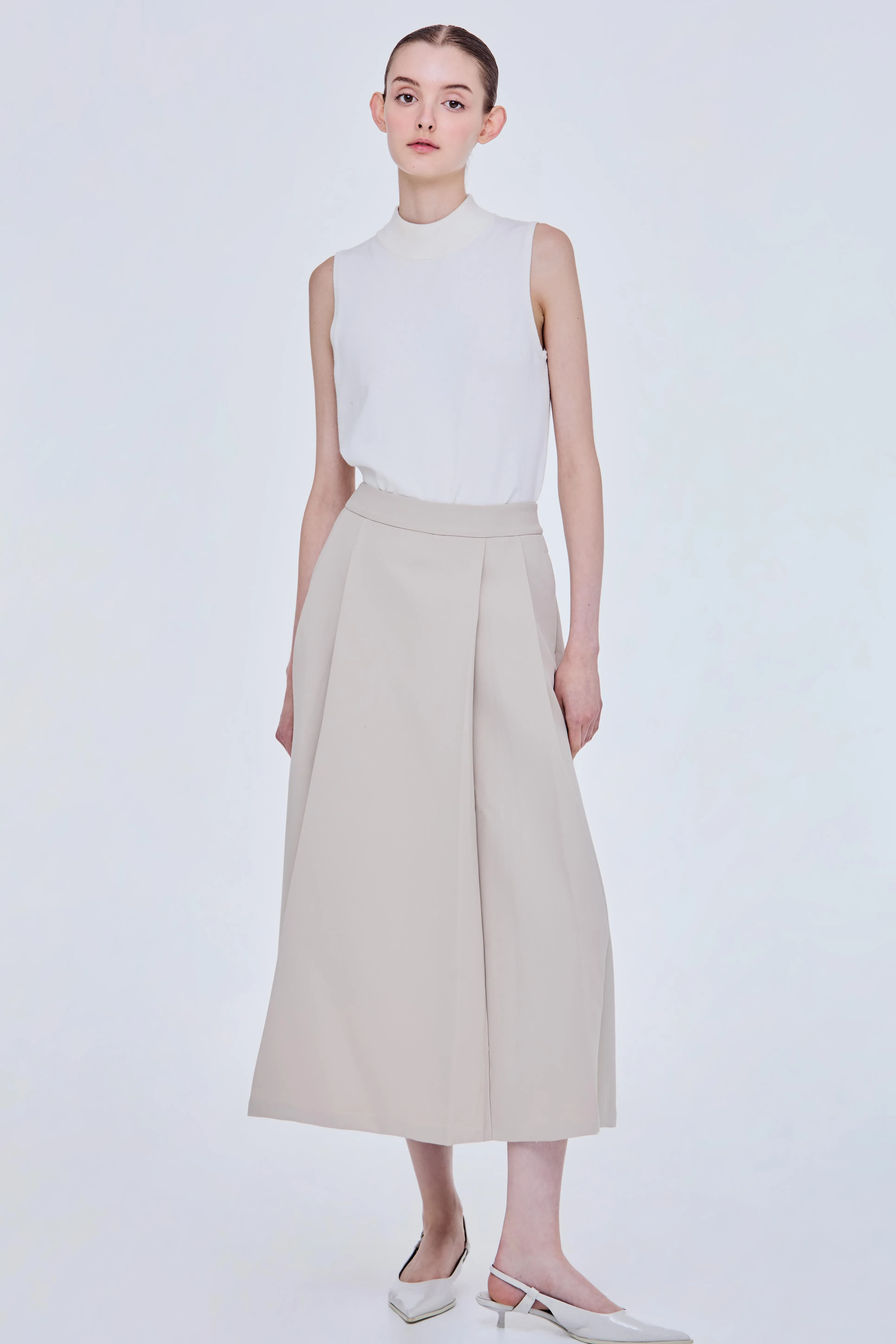 PLEATED FLARE SKIRT - BEIGE