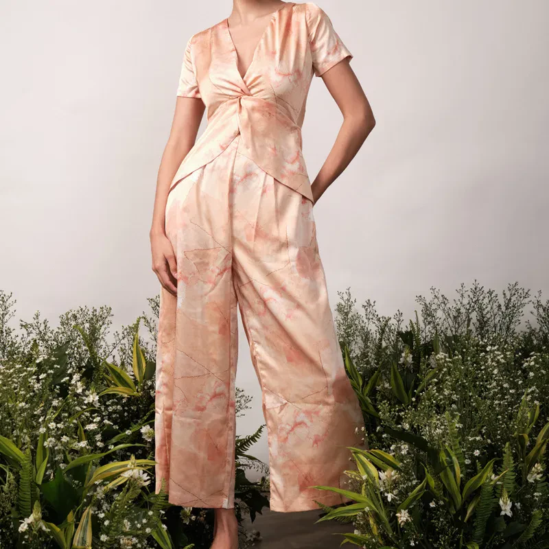 FRONT TWIST JUMPSUIT IN PRINT
