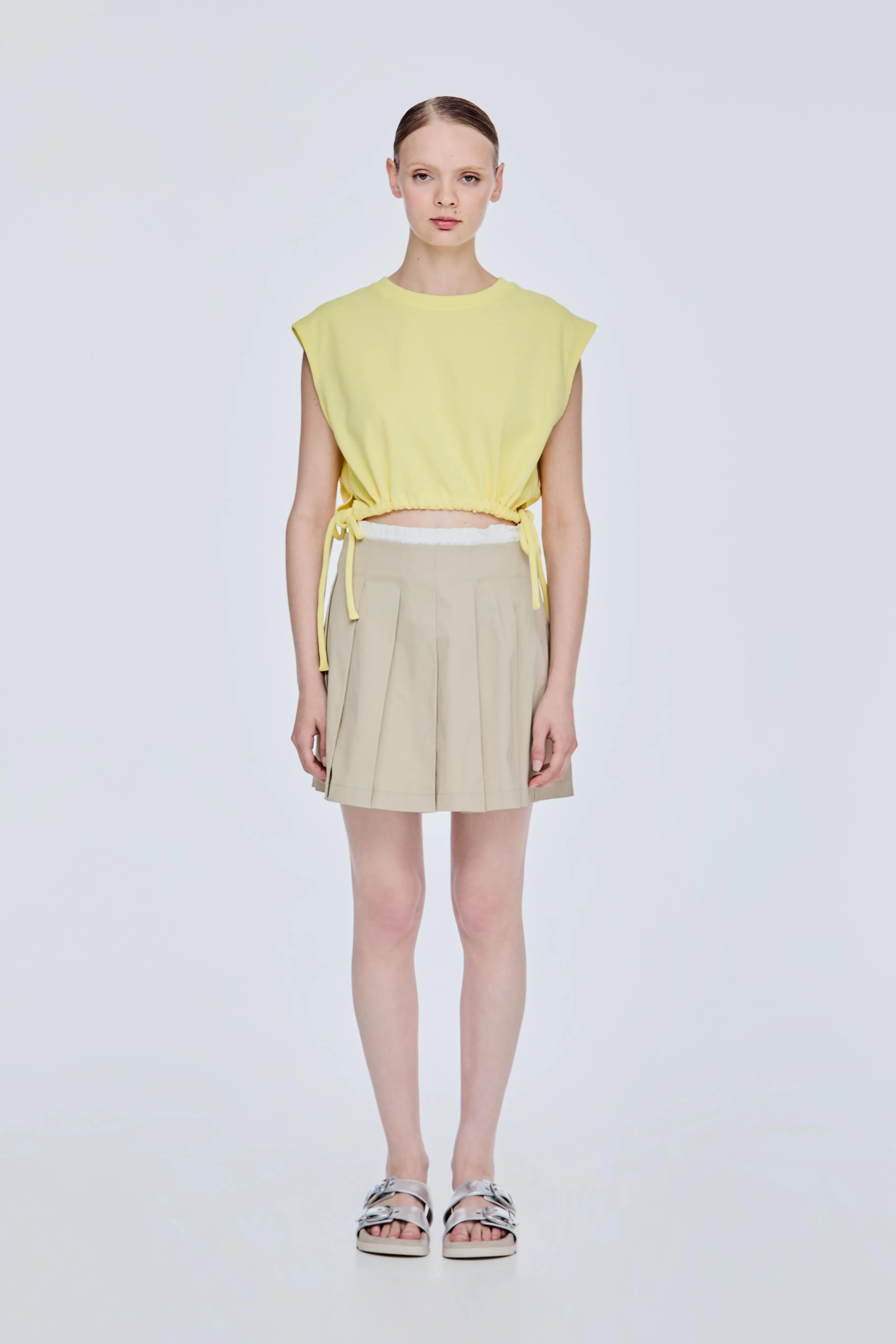 PLEATED MINI SKIRT - BEIGE